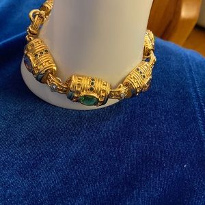 Bracelet with green light violet stones